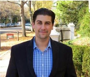 male posing, black jacket, blue shirt