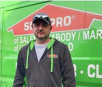 male posing front of truck