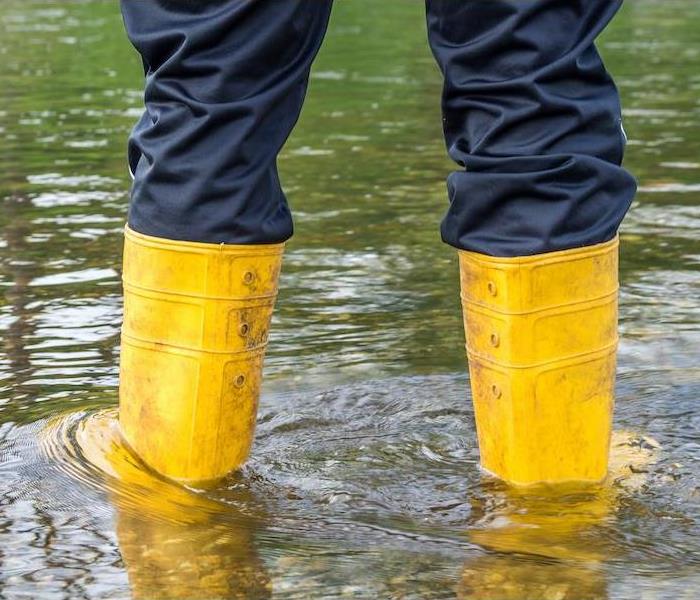 Boots in flood water