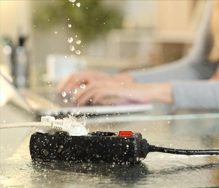 water splashing from conduit by electronics
